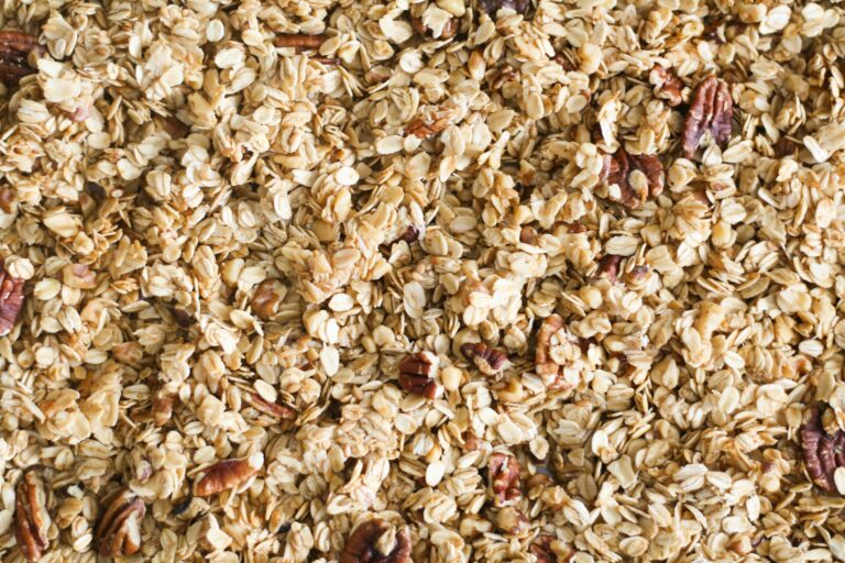 Close-up of homemade oat and pecan granola, perfect for a healthy breakfast.